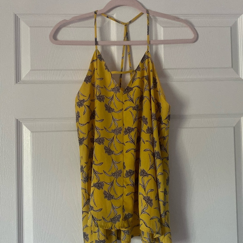 Woman’s top , yellow with floral